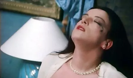 مقعد با یک بلوند روی یک فیلم سینمایی سکسب نیمکت نرم